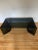 Origami coffee table designed by Neal Small from the 1960s. The table is in its original condition. Made of bent, dark,...