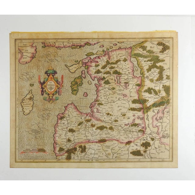 Circa 1620 map of Livonia the Baltic states of Estonia and Latvia. Decorative title and cartouches, hand colored. G....