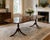 A distinguished double pedestal dining table by Charak Furniture Company of Boston, dated 1954. Crafted in the refined...