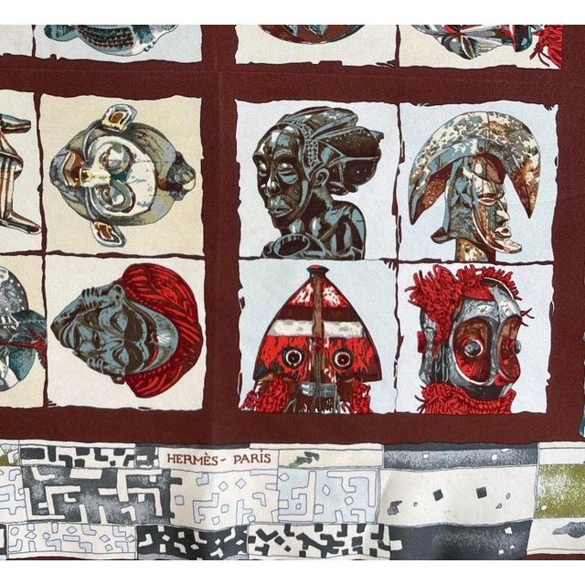 Hermès gavroche scarf silk PERSONA design Loïc Dubigeon 2003 This Hermes scarf, with its red, brown, and white background,...