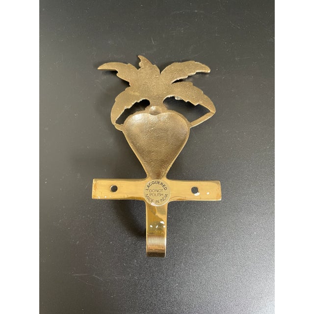 Vintage Solid Brass Radish Garden Wall Hook. Anti tarnish lacquered coating. Nice condition, minor surface scratches....