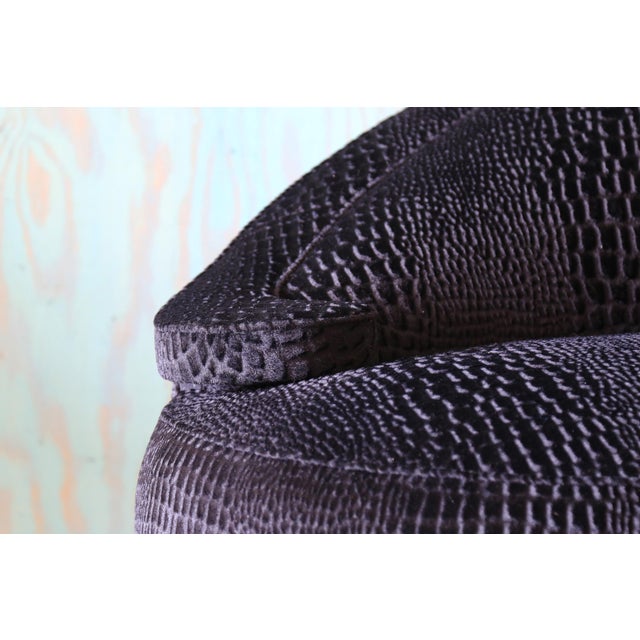 Curvy and sculptural the Schiaperelli sofa designed by Michael Taylor for Michael Taylor Designs. This vintage example...
