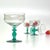 Emerald champagne glasses, group of 6. A dazzling set of 1940s vaseline uranium champagne coupes by Bryce Originals,...