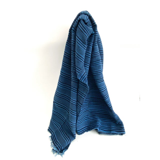 This vintage handwoven indigo textile is traditional to Guatemala and is woven in narrow panels then sewn together to...