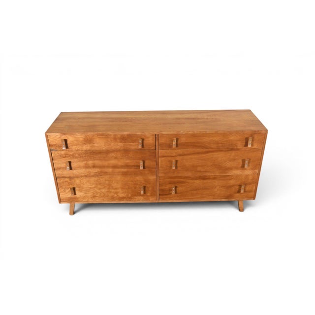 This six-drawer dresser was designed by Stanley Young and produced by Glenn of California in the USA during the 1960s....