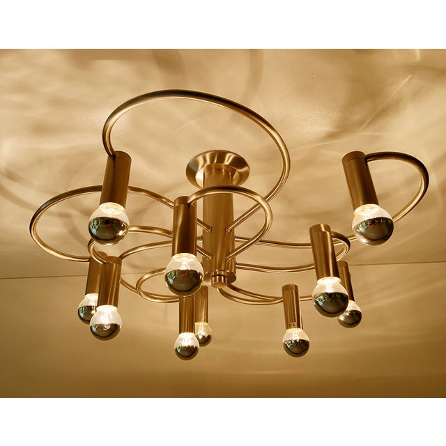Large ceiling light featuring 2 tier with each 5 spiraling spokes, brushed bronze finish brass structure dimensions: h...