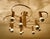 Large ceiling light featuring 2 tier with each 5 spiraling spokes, brushed bronze finish brass structure dimensions: h...