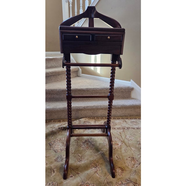 A stylish and elegant dressboy or valet stand. Nicely planned with two small drawers for buttons or jewelry and a robust...