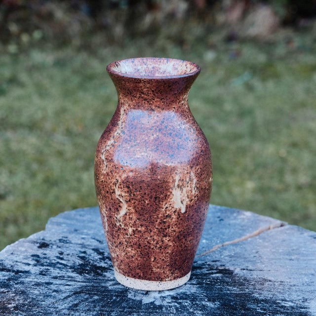 Tall speckled vase, wheel-thrown from speckled stoneware and hand-painted with "Chai Gloss Shino" glaze. Brand: Hiraeth...
