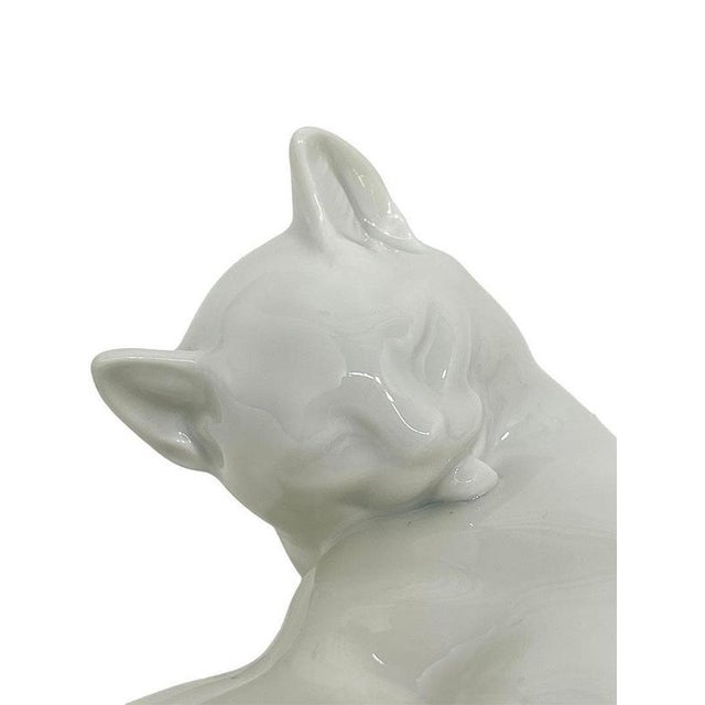 Sitting Cat (1934) by Robert Ullmann for Augarten, Vienna A white-glazed Augarten porcelain cat, designed by Robert...