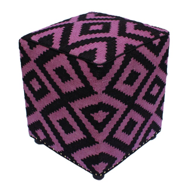 Chic handmade ottoman crafted using wood and upholstered using hand-woven kilim wool rug is a multi-purpose fashion pouf...