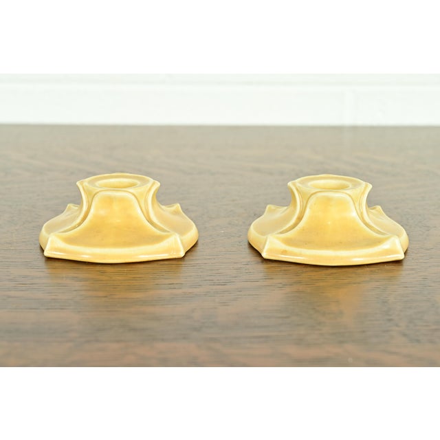 A gorgeous pair of Arts & Crafts glazed art pottery candlestick holders By Rookwood Pottery USA, 1922 Glazed ceramic in a...
