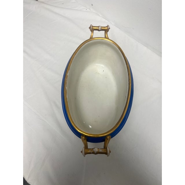 Antique French circa 1900 Old Paris hand painted jardiniere with gilt accents and different flowers on each side.