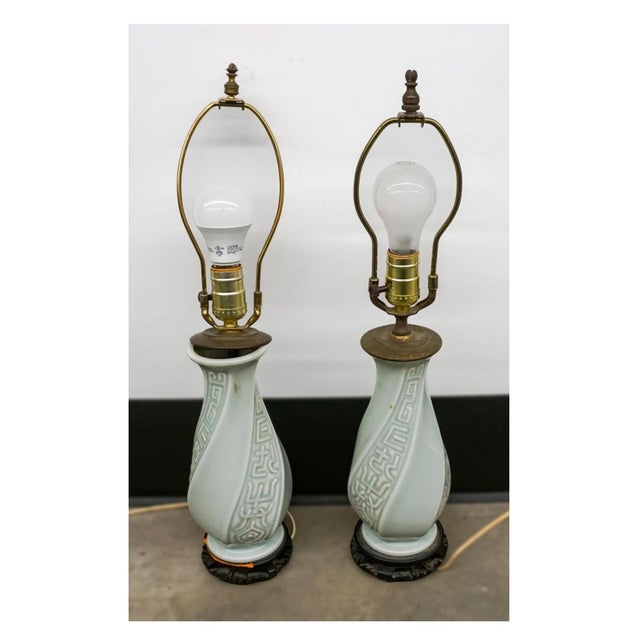 Pair of Chinese Celadon Glaze Porcelain Vases Mounted as Table Lamps Dimensions: 5" in width, 5" in depth and 21.5 inches...