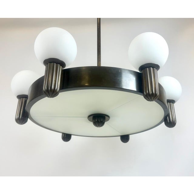 The chandelier has metric threads, suggesting it was made in the UK. It has undergone a comprehensive restoration,...