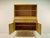 A simple and elegant vintage display cabinet from the 1960s in the Scandinavian Modern style. The piece impresses with its...