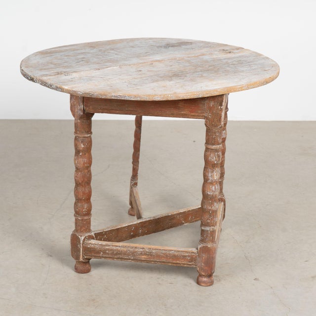 There is wonderful aged charisma to this drop leaf gate leg table that can serve as a side table, game table, demi-lune...