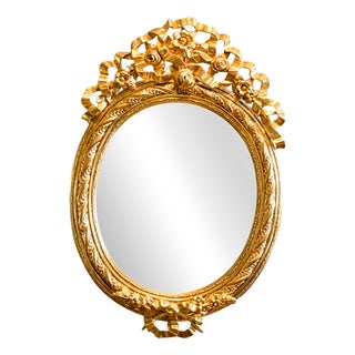 Mirror in Richly Decorated Gilded Frame For Sale