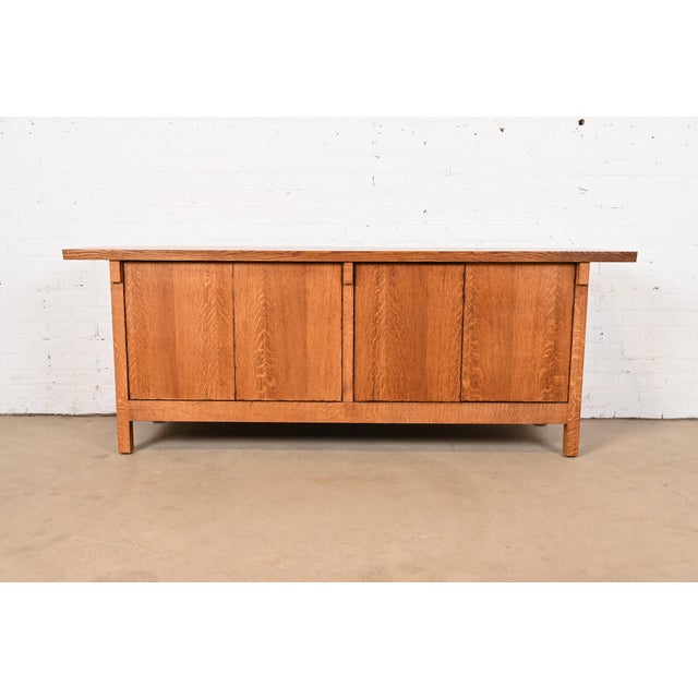 A gorgeous Mission or Arts & Crafts style quarter sawn oak sideboard, buffet server, or bar cabinet In the manner of L. &...