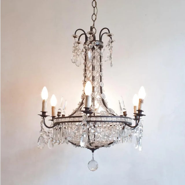 The chandelier comes from Italy and has six E14 versions. The small lampshades have been new and added by us. This makes...