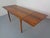 Double-extendable rosewood dining table from the 1960s. Height 74 cm. Width 120-210 cm. Depth 80 cm. Diameter 143-224 cm