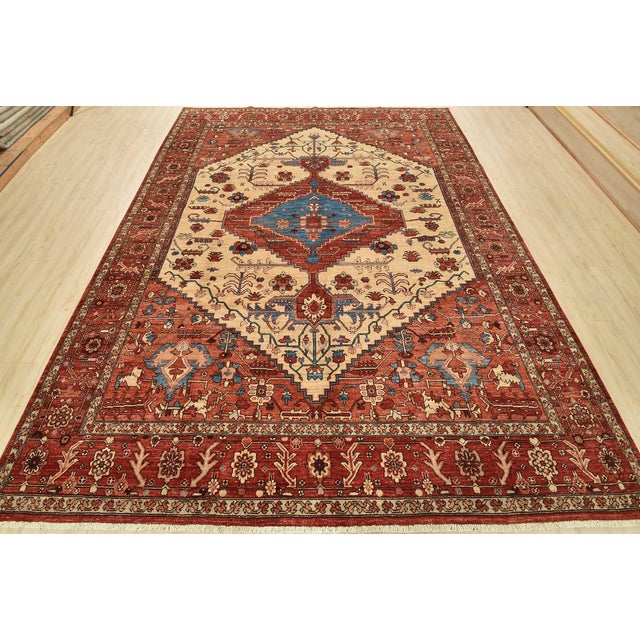 This traditional tribal Serapi Ziegler rug is hand-knotted with an all-wool pile on a cotton foundation. This rug is new...