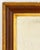 American Gilt Trim and Mahogany Framed Mirror. Mirror plate: 26" H x 14.75" W; frame: 34.25" H x 23" W x 2" D. Provenance:...