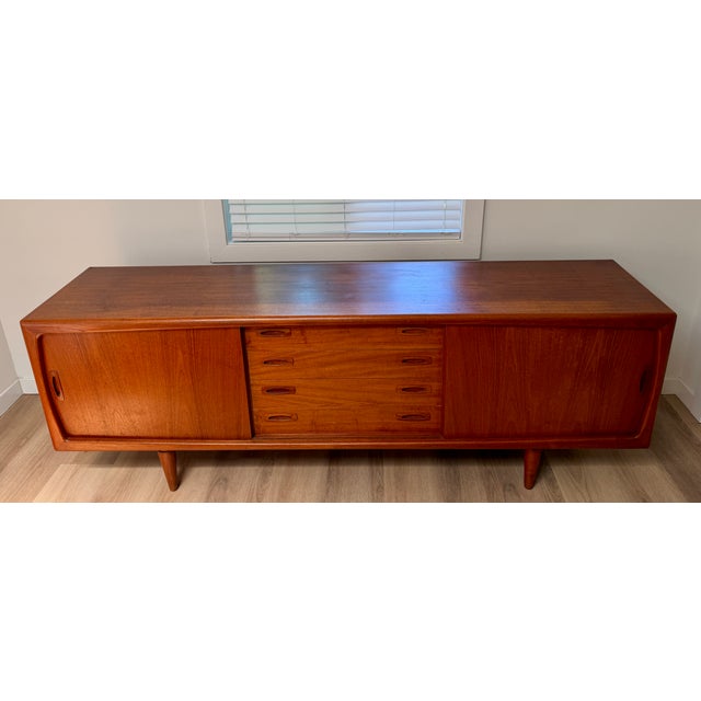 This piece of beautiful furniture is located in SF Bay in CA. This mid-century sideboard, crafted by the famous H.P....