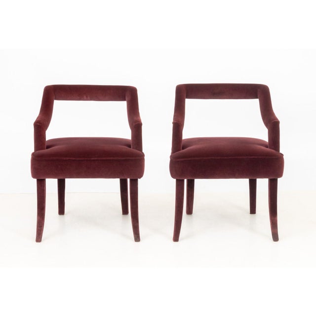 Pair of Brabbu Red Velvet Upholstered Chairs, with plaque labels to undersides. 29.5" H x 23.25" W x 22.25" D; seat: 18.5"...