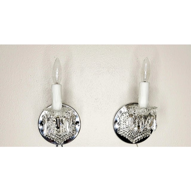 Versatile and full of shimmer, these 1950s crystal sconces are perfect for any spot that's needs a burst of light. They...