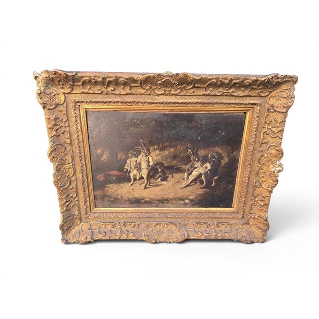 A charming and highly unusual 19th-century oil painting on wooden panel entitled The Rabbit Duel, depicting an imaginative...