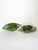 Charming pair of French ceramic bowls dating from the 1960s, featuring a rich green glazed finish with subtle variations...
