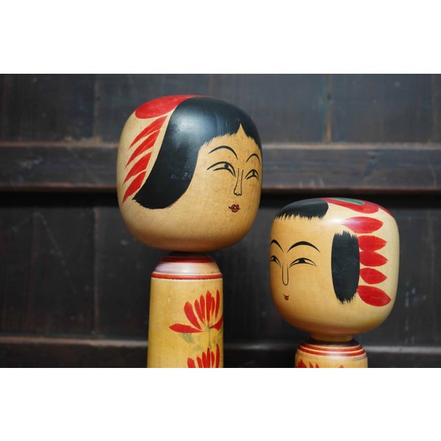 Beautiful and colorful set of traditional 'Hijiori' Kokeshi dolls made by Sato Jyunosuke and Sato Shoichi. These vintage...