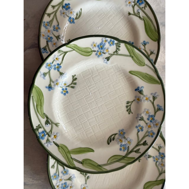 Lovely set of three vintage salad plates by Franciscan in the Forget Me Not pattern. These plates feature delicate hand-...
