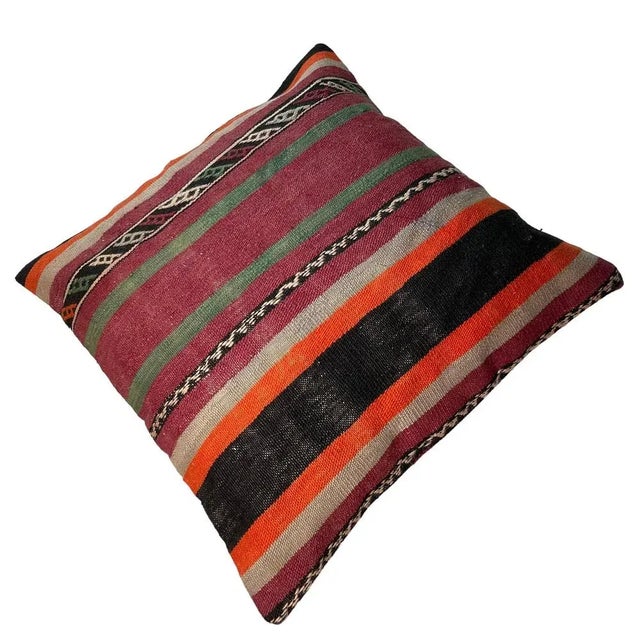 Introducing our handmade Kilim Pillow Cover, measuring 60 x 60 cm, crafted from vintage kilims from the 1970s in Turkey....