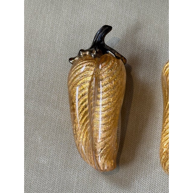 Design Plus Gallery presents a Set of Two Art Glass Sculpture of Peppers. They are likely vintage Italian Murano...