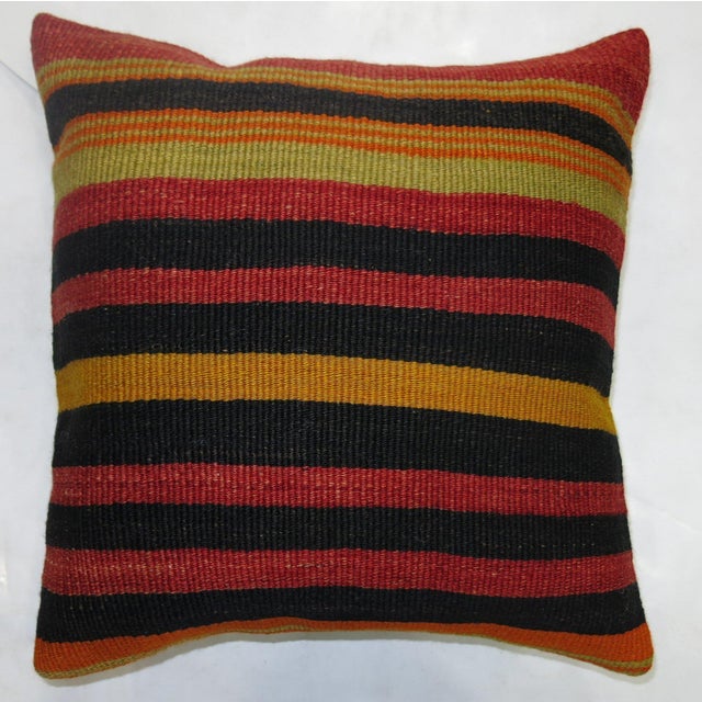 Pillow made from a vintage striped turkish kilim Measures: 16" x 16".