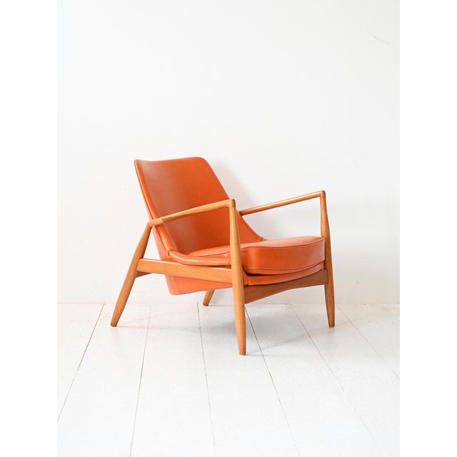 Salen model no. 799 by Ib Kofod-Larsen for OPE, upholstered in orange leather. Salen model no. 799 designed by Ib Kofod-...