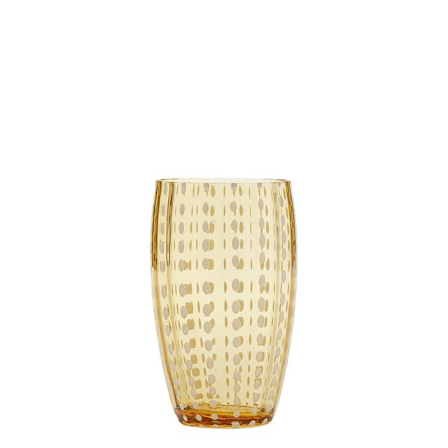 Collection for the table in clear colored glass. It includes tumblers for water and soft drinks, wine glasses, flute...