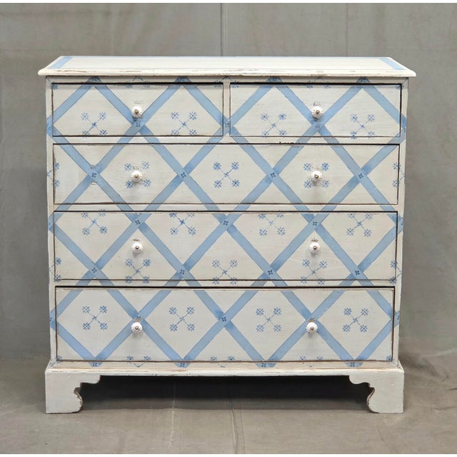 A gorgeous vintage mid 20th century English pine chest of drawers dresser that has been recently distress hand painted and...