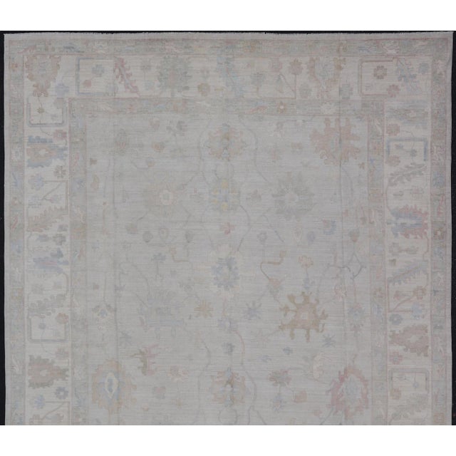 Large Modern Oushak Rug in Soft Gray With Faded Pastel Motifs and Subtle Design For Sale - Image 4 of 15