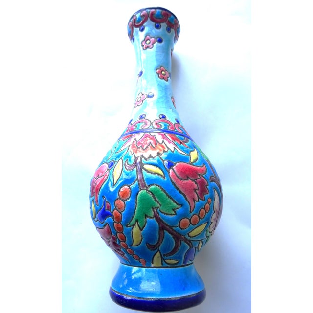 Hand painted longwy vase marked with "a.m.f" and "decor 5685" nice patina, no damages. Diameter top end 3.5 cm; bottom end...