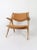 Armchair Sawbuck CH28 designed by Hans J Wegner for Carl Hansen, produced 70's Denmark. The frame of the chair is made of...