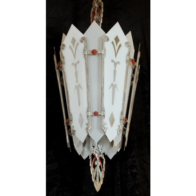 Art Deco 1930s polychrome aluminum frame pendant light with etched glass. This has six sockets. This has been restored....