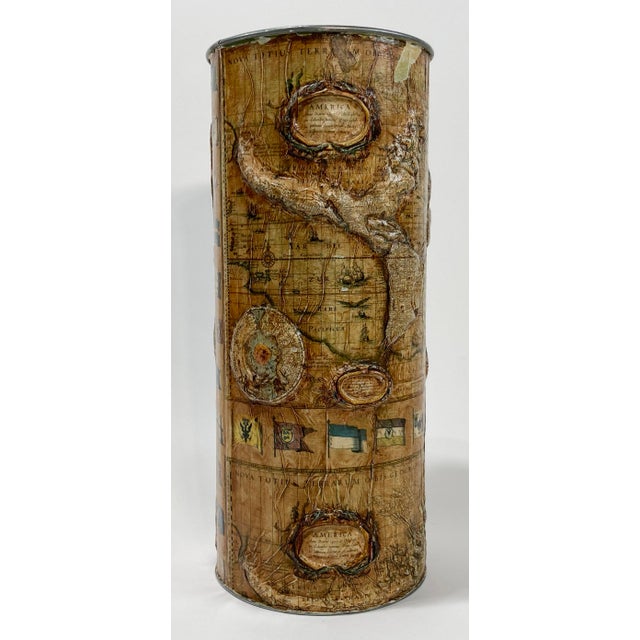 Vintage metal umbrella stand or waste basket featuring detailed raised relief decoupage world map. Includes maps to...