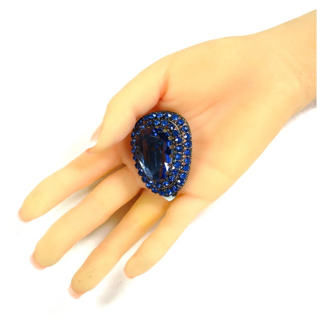 Vintage 1930s Art Deco Czech gold-washed sapphire blue crystal brooch/clip. Three-dimensional tiered design w/ a huge...