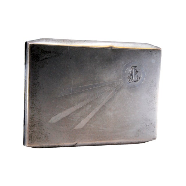 Silver Cigarette Case with Three Raised Stripes on the Lid, in Good conditions. Designed 1920 to 1949