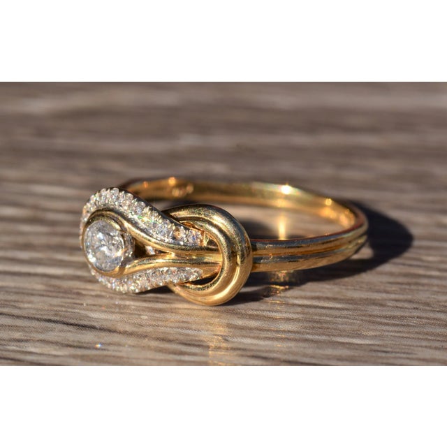 The Chaldene: Diamond Overlapping Knot Ring in 14 Karat Yellow Gold For Sale - Image 4 of 8