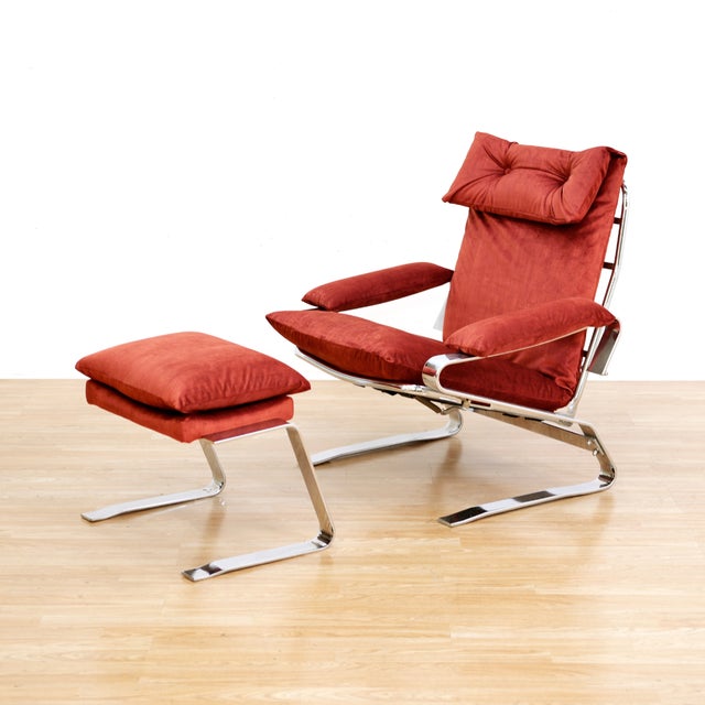 This swing lounge chair with ottoman was manufactured in the 190s. With a distinctive free-swinging body the frame is made...