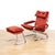 This swing lounge chair with ottoman was manufactured in the 190s. With a distinctive free-swinging body the frame is made...